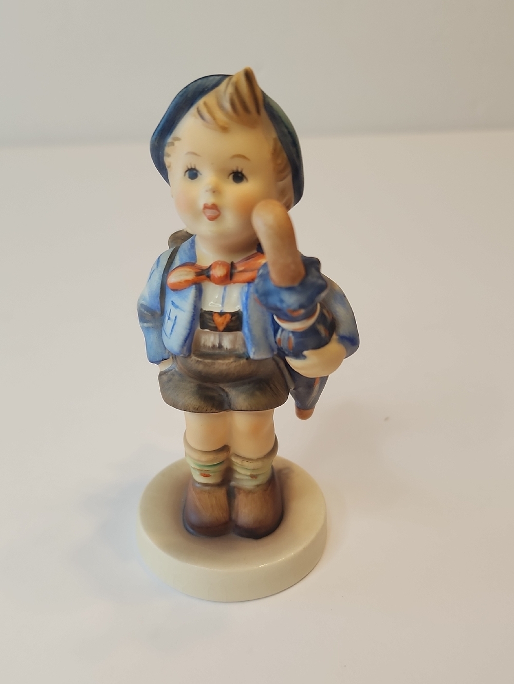 Hummel Goebel "Market Boy" Hand-Painted Porcelain Figurine in Blue and Brown